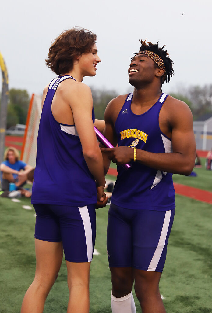 Harrison Zink congratulates Edward Nelson for breaking the record